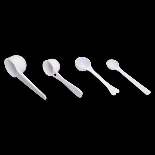 White plastic measuring spoon - white,